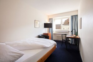 Small Single Room | Hypo-allergenic bedding, down comforters, in-room safe, desk