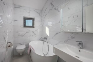 Family House, Multiple Bedrooms (Pool House Old Town) | Bathroom | Combined shower/tub, towels, soap, shampoo