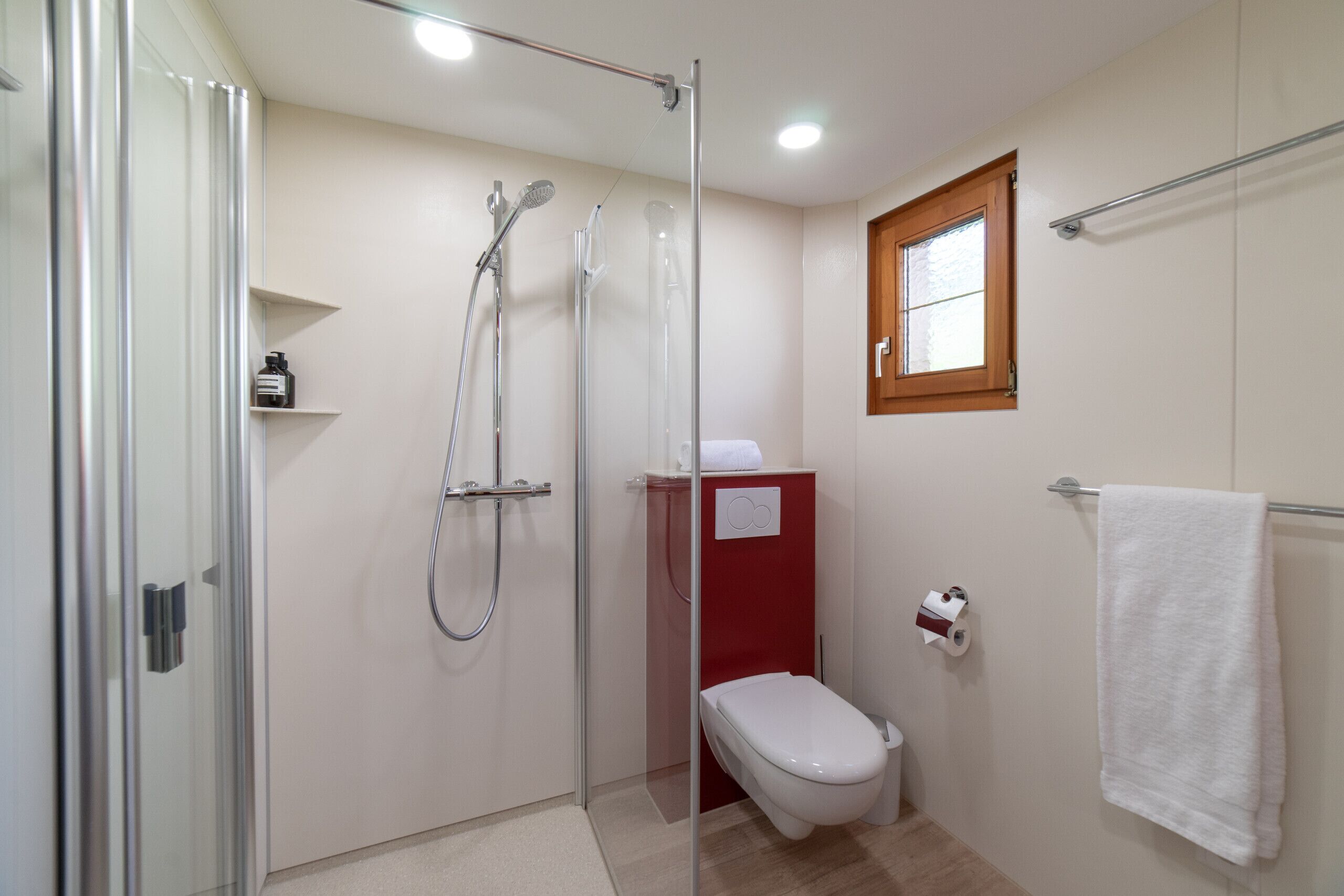 Shower, hair dryer, towels, toilet paper
