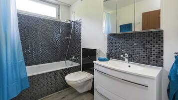 Hair dryer, towels, toilet paper