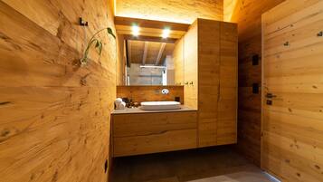 Shower, hair dryer, towels, toilet paper