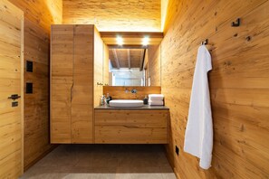 Shower, hair dryer, towels, toilet paper