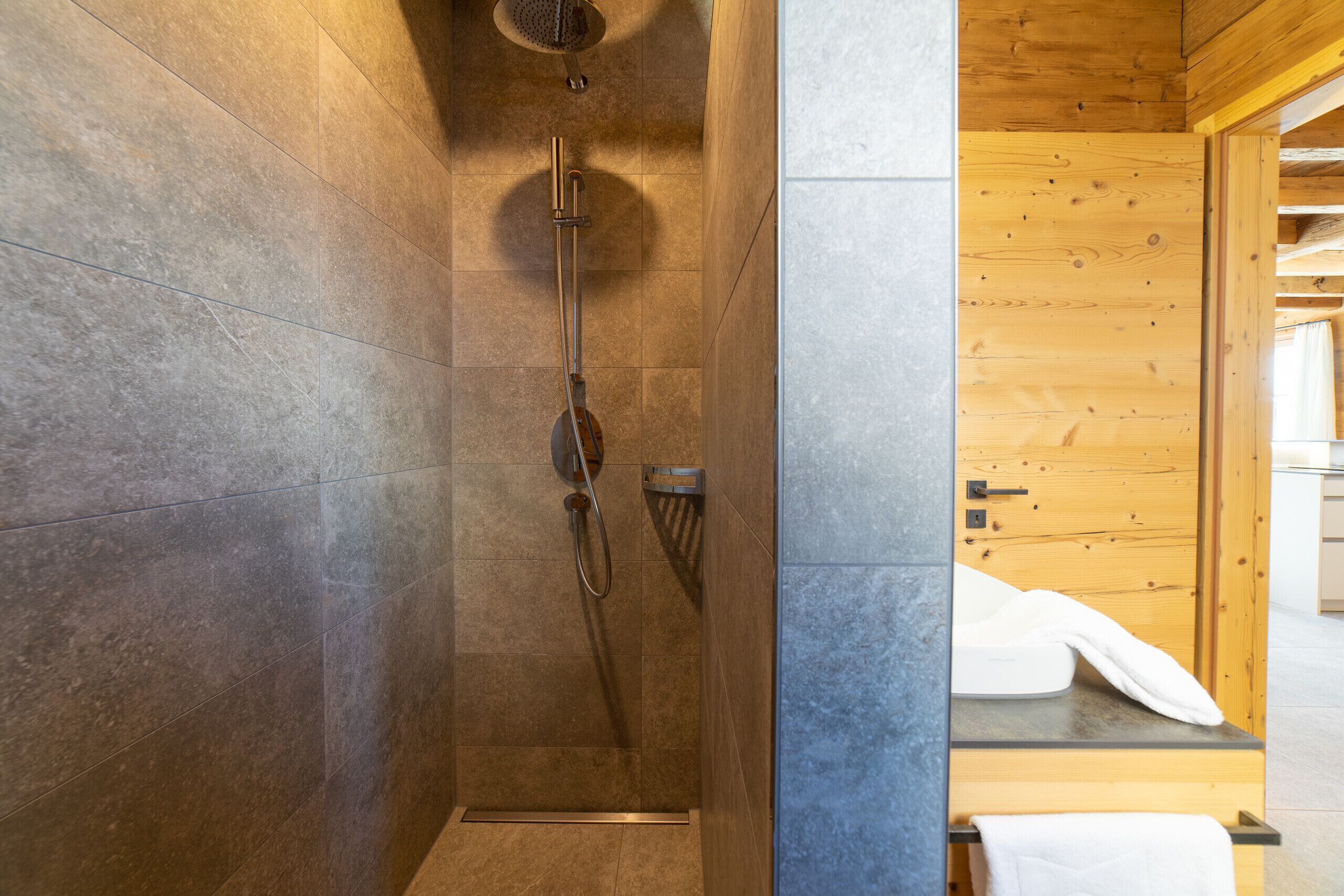 Shower, hair dryer, towels, toilet paper
