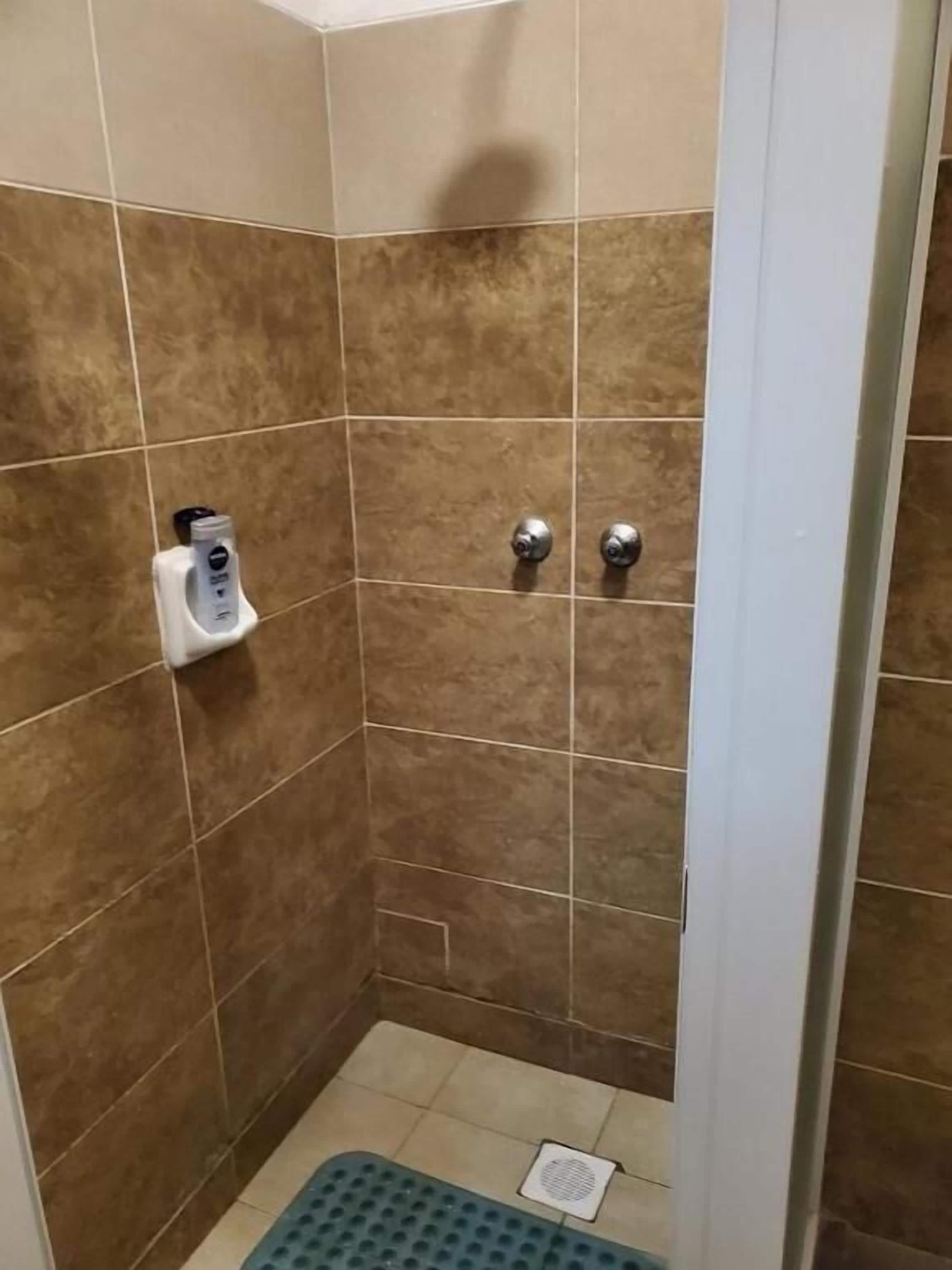 Shower, slippers, bidet, towels
