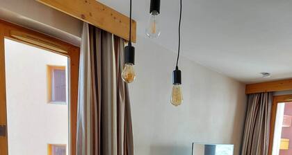 Appartement chaleureux aux domaine Paradiski