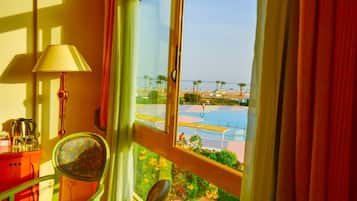 Standard Double or Twin Room, Pool View | Minibar, in-room safe, individually furnished, soundproofing