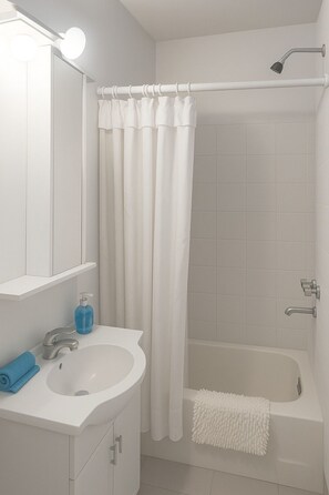 Hair dryer, towels, soap, shampoo