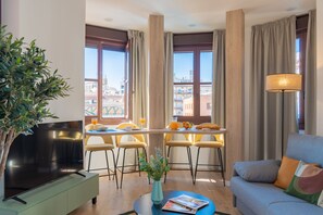 Apartment, 2 Bedrooms | Living area | 50-inch flat-screen TV with digital channels - Feelathome Atarazanas Apartments (Málaga)