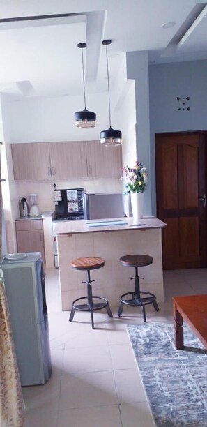 Deluxe Apartment | Private kitchen | Fridge, microwave, cookware/dishes/utensils - Lux Suites Sunset Holiday Homes shanzu (Mombasa)