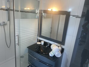 Hair dryer, towels, soap, shampoo