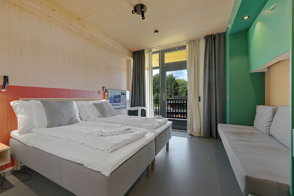 Habitación individual | Escritorio, espacio para trabajar con laptop y insonorización