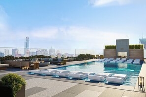 Outdoor pool, free pool cabanas, pool umbrellas - 2BR Condo near Rainey St | Heated Pool | Gym | Bar (Austin)