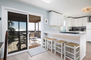 Fridge, dishwasher, coffee/tea maker, cookware/dishes/utensils