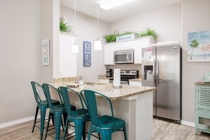 Fridge, microwave, oven, stovetop - Spacious Pet-Friendly Townhome with Heated Pools Just Steps from the Beach (Corpus Christi)