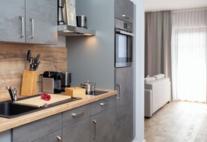 Kylskåp, ugn, spishäll och diskmaskin