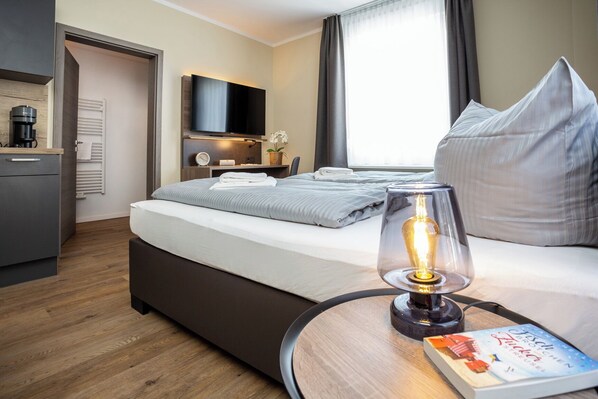 Desk, iron/ironing board, travel cot, free WiFi