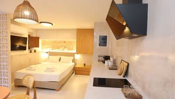 1 bedroom, desk, iron/ironing board, travel crib