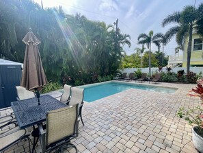 Outdoor pool, a heated pool - 3 Bedroom, 2 Bath Ground Level with Heated Pool - Short walk to the beach. (Holmes Beach)