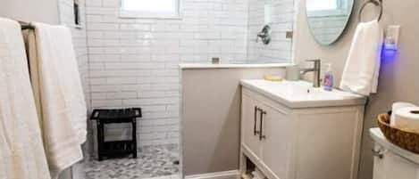 Hair dryer, towels, soap, shampoo