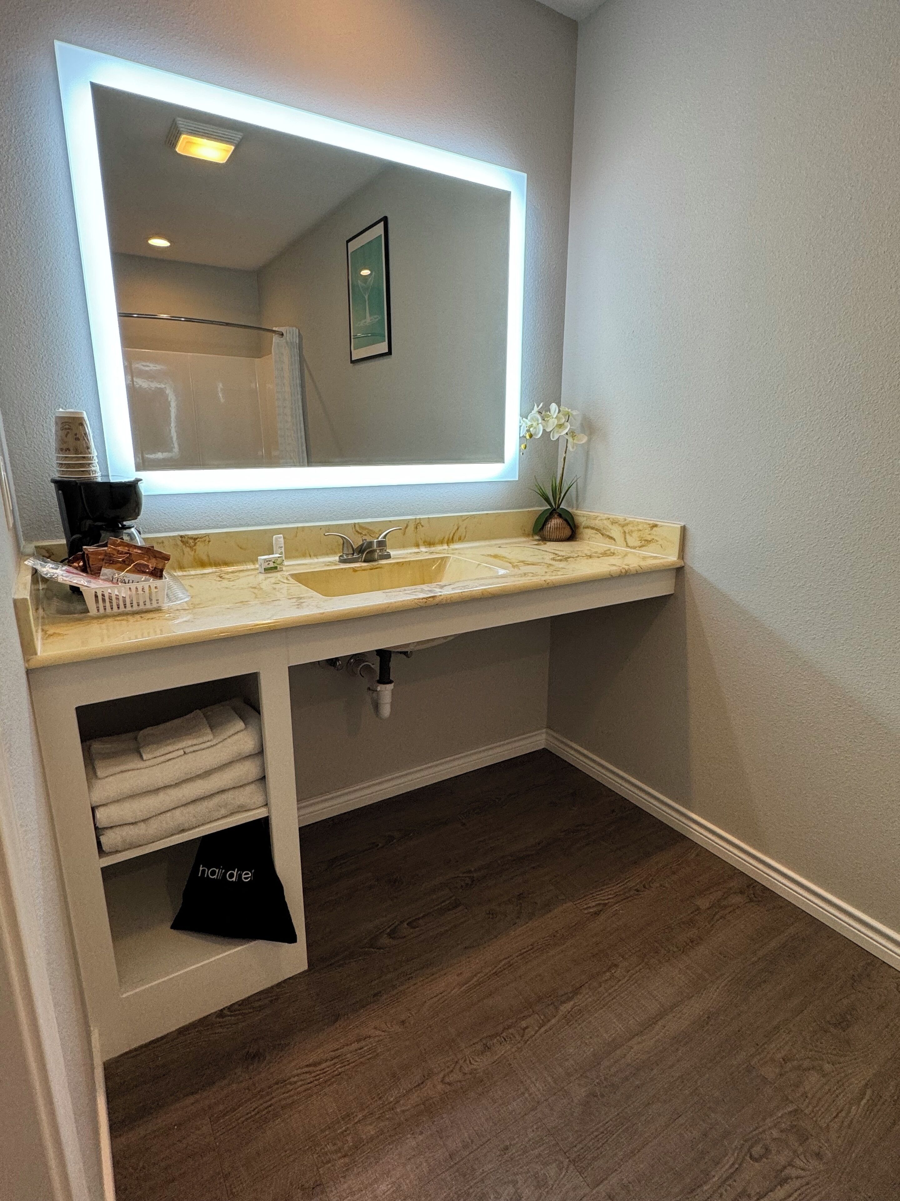 Hair dryer, towels, soap, shampoo