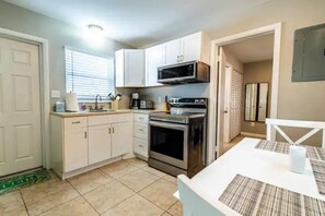 Fridge, microwave, oven, stovetop - Tropical Breezes - Walk to the Beach (Lantana)