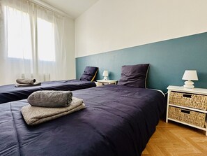 2 slaapkamers, een strijkplank/strijkijzer, gratis wifi