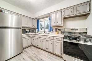 Fridge, microwave, stovetop, coffee/tea maker