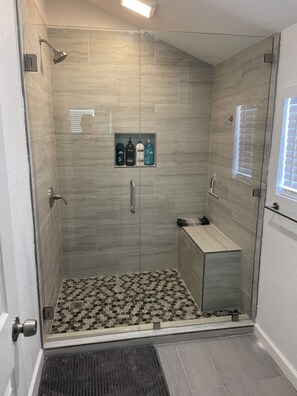 Shower, hair dryer, towels, soap