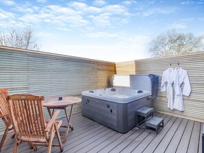 Bañera de hidromasaje al aire libre