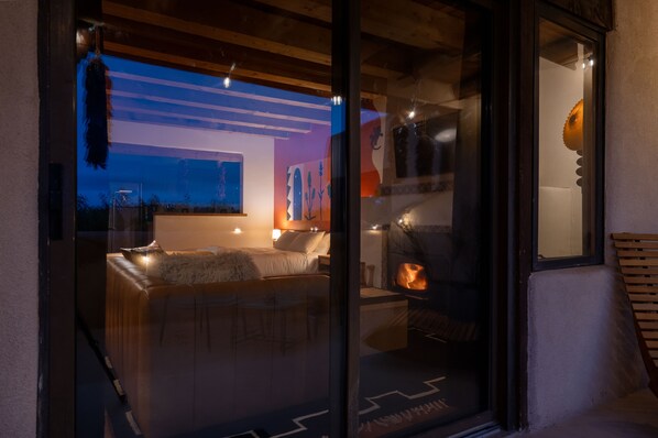 Terrace/patio - Cozy adobe studio with private balcony, mountain views, and classic Southwest charm—just minutes from Taos, Arroyo Seco, and Taos Ski Valley. Perfect for a peaceful canyon escape with modern comforts. (Valdez)