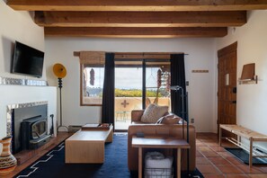 Smart TV, fireplace - Cozy adobe studio with private balcony, mountain views, and classic Southwest charm—just minutes from Taos, Arroyo Seco, and Taos Ski Valley. Perfect for a peaceful canyon escape with modern comforts. (Valdez)