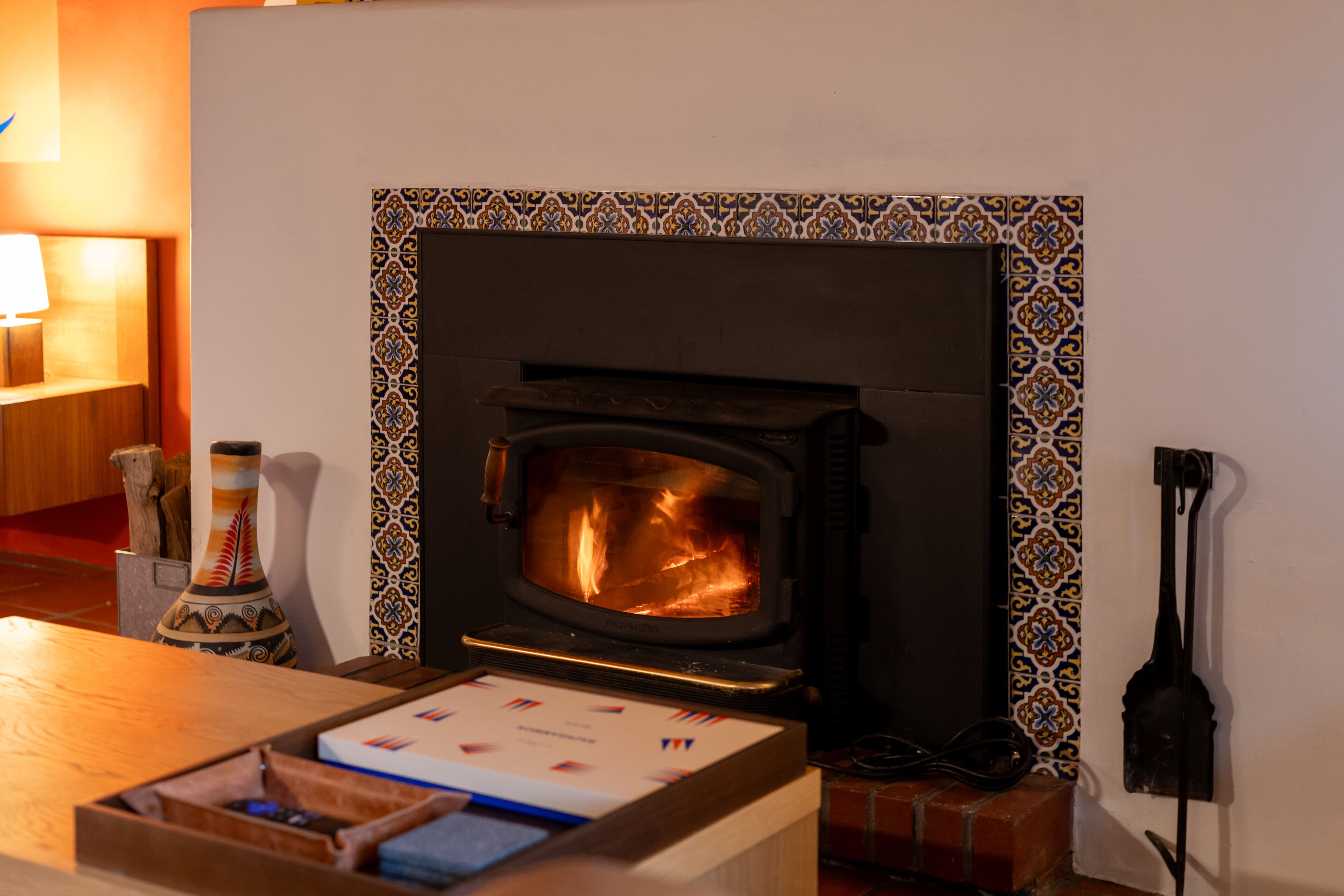 Crackling wood-burning fireplace to warm up chilly nights in the mountains.