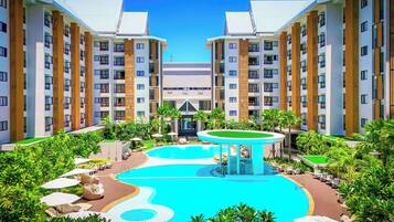 Outdoor pool, open 8:00 AM to 10:00 PM, pool umbrellas, sun loungers