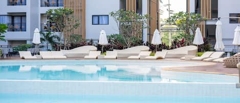 Outdoor pool, open 8:00 AM to 10:00 PM, pool umbrellas, sun loungers