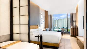 Premium Room, 1 King Bed, Non Smoking, City View | Minibar, in-room safe, desk, laptop workspace