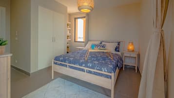 Apartemen Basic | 2 kamar tidur, setrika/meja setrika, dan Wi-Fi gratis
