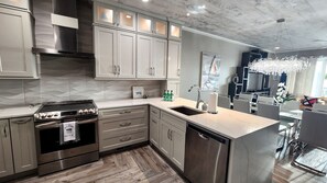 Fridge, microwave, oven, stovetop - Luxury Modern European beachfront home with pool table and sauna in Tybee Island (Tybee Island)