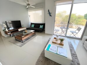 Family Apartment | Living area | 32-inch flat-screen TV with digital channels