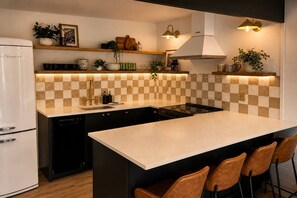 Beautiful fully stocked kitchen with, electric range, dishwasher and fridge.  - Riverfront Cabin: Iconic Mt. Index Views & Hot Tub (Gold Bar)