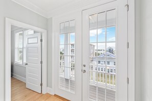 Corridors lead to balconies with views of the surrounding area.