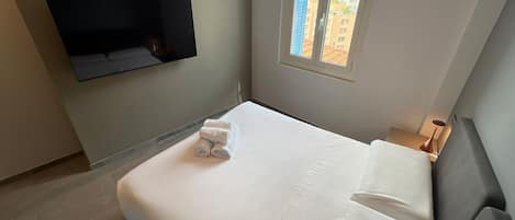 1 chambre, fer et planche Ă repasser, Wi-Fi, draps fournis