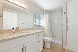 Hair dryer, towels, soap, shampoo