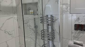 Shower, hair dryer, towels
