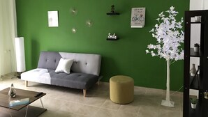 Family Apartment | Living area | 32-inch LCD TV with digital channels - Midway Point Apts  (Heraklion)
