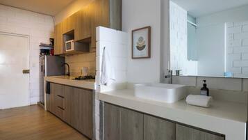 Fridge, microwave, stovetop, coffee/tea maker