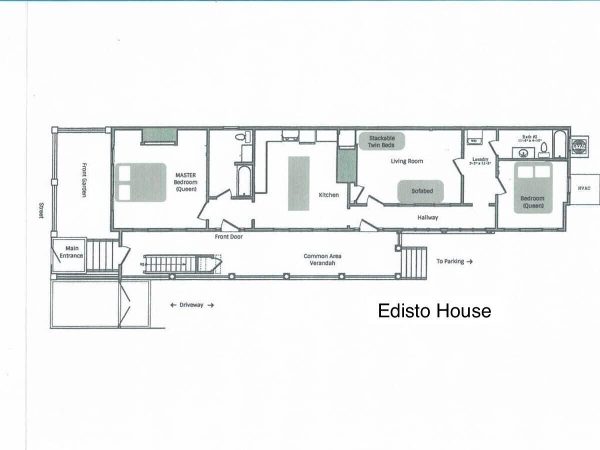 Planta baixa da Edisto House, mostrando um quarto principal, um quarto com cama de casal, cozinha, sala de estar e área comum.