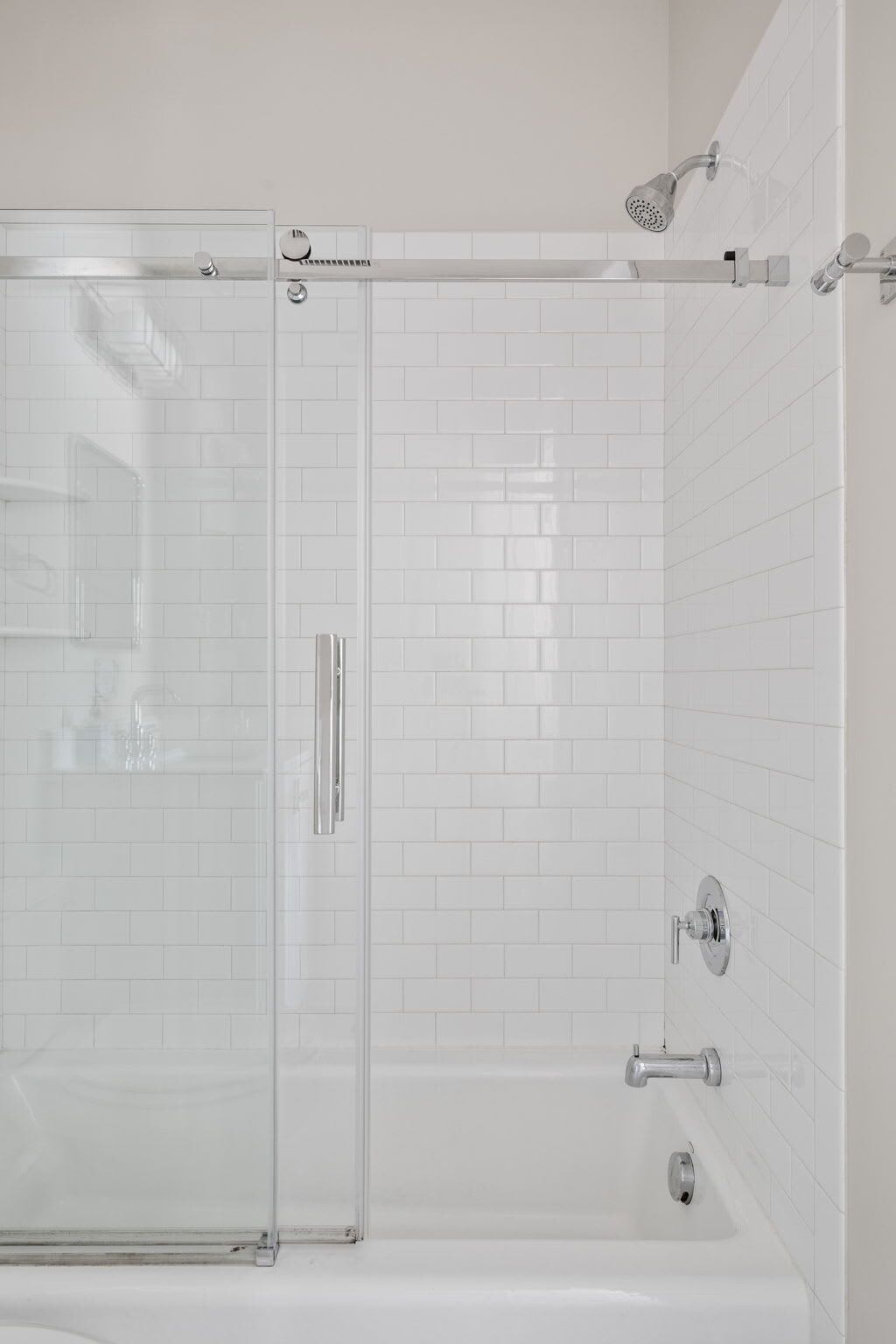 Shower, hair dryer, towels, shampoo