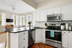 Fridge, microwave, oven, stovetop - Downtown Historic Condo Steps to King Street (Charleston)