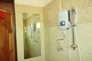 Shower, towels, soap, toilet paper