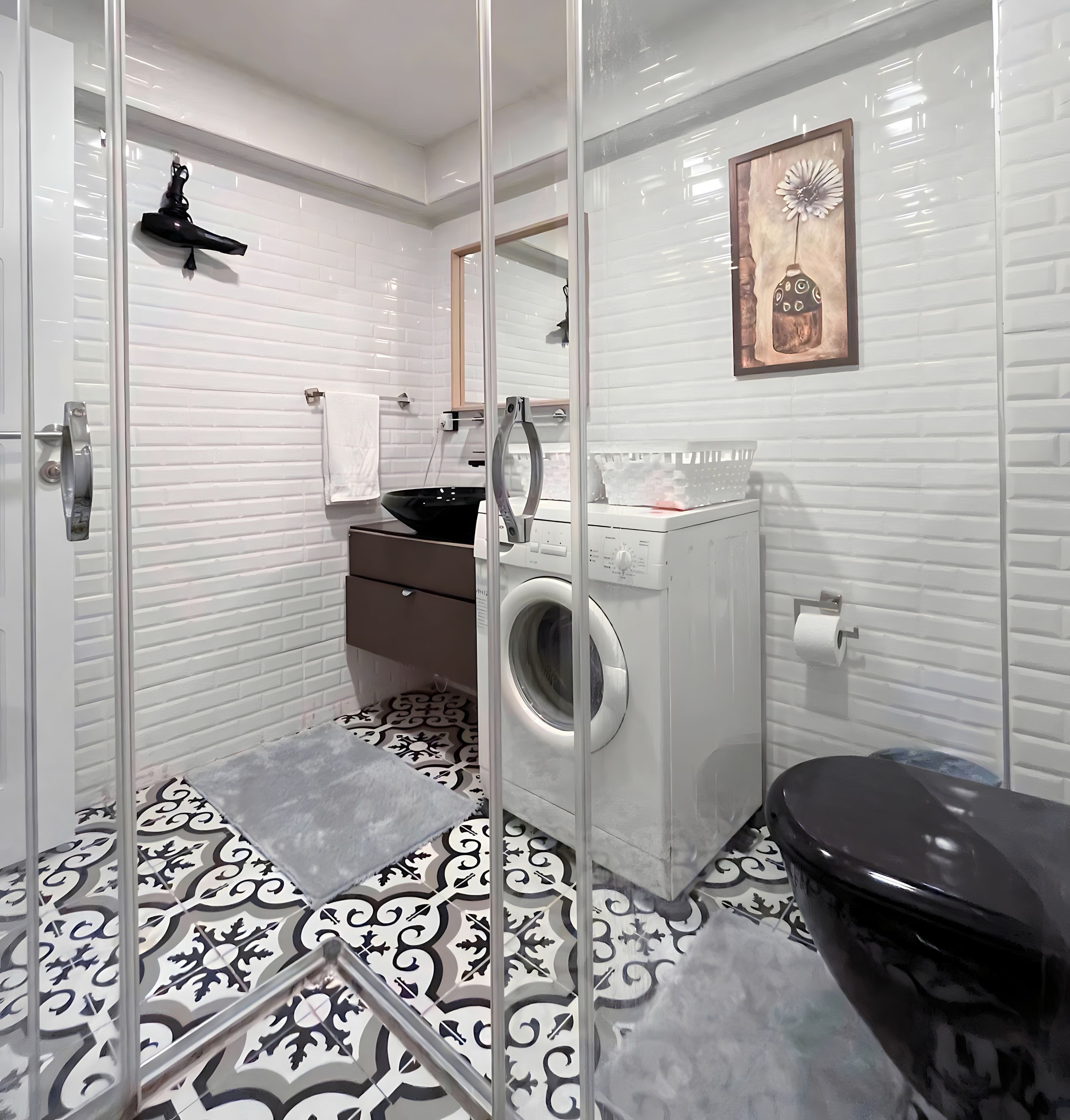Apartamento urbano | Banheiro | Chuveiro, secador de cabelo, toalhas de banho, sabonete